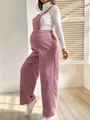 Dettaglio della salopette premaman in velluto a coste rosa con vita elastica - S / Rosa
