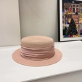 Pink straw boater hat with pleated satin ribbon decoration on a white surface - Pink/Same Color Ribbon