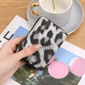 Compact black and silver leopard print card holder with secure metal zipper closure - Black