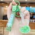 Green crystal guitar keychain with kiwi fruit slices and glitter in sand oil - Fruit Violin - Kiwi