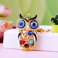 Sparkling owl keychain in gold metal with colorful rhinestones and enamel finish - A430 Owl E Colorful