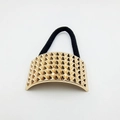 Detail of a gold studded metallic cuff on a black elastic hair tie with punk rivet design - Conical Stud Decoration (Hair Tie 55)