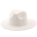 Detail of white woven straw Panama hat featuring a classic indented crown and smooth brim - Pure White