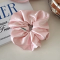 Pink satin oversized hair scrunchie with silk texture and woven label for elegant styling - Glossy Pink