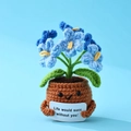 Detail of crochet blue flower pot with positive message Life would succ without you - Positive Potted-Forget-me-not Gradient Blue