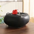 Zen ceramic water fountain with red koi fish motif on a matte black basin - Like Fish in Water [Black-Square]