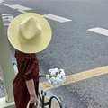 Children's woven straw sun hat in light yellow with a wide brim for vacation beach wear - Goose Yellow