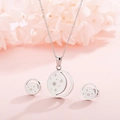 Close-up of silver star and moon pendant necklace and stud earrings jewelry set - Steel Color (KS133463-KFC)