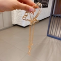 Elegant gold butterfly hair claw clip with long tassel chains and clear beads for women - P157 Gold Butterfly Tassel