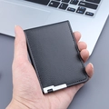 Slim black leather card holder with litchi texture and silver metallic buckle detail - Basic Style / Black