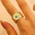Detail of 18K gold-plated stainless steel ring featuring turquoise and hammered texture - 43 18k Pure Gold Dz012