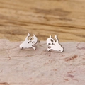 Cartoon ghost stainless steel stud earrings displayed on natural rock and wood background - Large Ghost / Steel