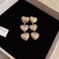 Vintage style metallic triple heart drop earrings displayed in a luxury jewelry box - 12# Heart Shape