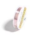 Detail of 0.4mm rose gold copper wire for DIY jewelry making on a white spool - Pink (Tarnish Resistant)