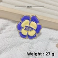 Vintage octagram star brooch with blue and yellow enamel and orange rhinestones - Silver Yellow Blue Camellia