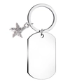 Close-up of a polished silver metal keychain featuring a starfish charm and blank tag - Starfish Charm