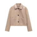 Kurze beige Kunstlederjacke für Damen mit Reverskragen und aufgesetzten Taschen - XS / Aprikose