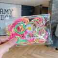 High-elastic hair bands in pink orange and green colors inside a zipper bag - Medium Neon Color Spiral 100pcs