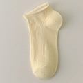 Pale yellow roll-top ankle socks for women featuring minimalist ribbed cotton knit texture - One Size / Tender Yellow