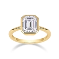Detail of emerald cut moissanite ring featuring a polished golden bezel setting - R15271-7*9mm+gra/black Card / US Size 7 / Circumference 54.3mm