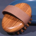 Detail of sandalwood massage hair brush with wooden bristles and woven handle strap - Sandalwood Bubble Massage Brush