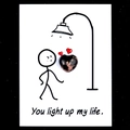 Natural heart-shaped rhodonite gemstone on a You Light Up My Life message card - Rhodonite