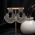 Close-up of vintage silver bohemian earrings with floral carving and bead tassels - H4417 Antique Silver