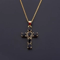 Close-up of gold cross pendant featuring micro-set black oval and small round zircons - Pendant Only / Black