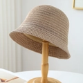 Beige woven wool bucket hat for women on a wooden stand with a soft natural lighting finish - M (56-58cm) / Solid Knit Style (5652) / Light Coffee