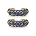 Detailed view of gold C-shaped ear cuffs pave-set with two rows of deep blue zircons - Gold Sapphire
