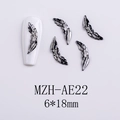 Detailed silver metal feather nail art charm with intricate texture, 6x18mm size - Feather Shape (AE22)