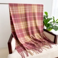 Detail of pink and yellow plaid cashmere scarf with soft tassels on a chair - Pink & Yellow Plaid (WT141-1)