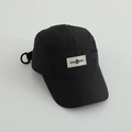 Detail of black quick-dry camper hat with CHANGE text label and metal side eyelets - Black