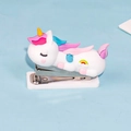 Portable mini stapler featuring a cute 3D cartoon unicorn on a white base for students - Unicorn