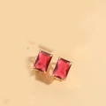 Elegant emerald-cut red crystal stud earrings featuring a classic gold-tone four-prong setting - Red (Gold)