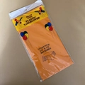 Detail of orange heavy duty reusable plastic tablecloth in packaging 137x183cm - 54x72 Inch / Orange