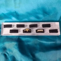 Transparent acrylic ring display with 8 black slots on blue silk background - 8 Slots Brushed Base Black Velvet 20*4.5CM