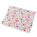 Detail of Valentine's gift wrapping paper featuring hand-drawn hearts and love motifs - Romantic Couple Style