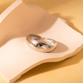Minimalist silver open ring with polished metal finish on a neutral aesthetic background - Steel Color 14
