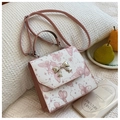 Pink butterfly print contrast crossbody bag with gold bow lock and adjustable strap - Pink