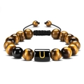 Handmade tiger eye bead bracelet featuring a black rectangle charm with golden letter U - Letter U
