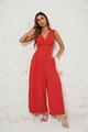 Detail van een rode mouwloze jumpsuit met V-hals, wijde pijpen en getailleerde pasvorm - S / Rood