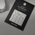 Macro detail of gold heart-shaped nail art charms with white pearls on a display card - Heart Pearl (Gold) / MJ-076 Gold