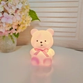 Pink and white bear night light glowing on table with a plaid bow tie decoration - Small Bear Purple - Pink