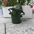 Dark green ceramic canister with attitude featuring unique curved handles and glossy glaze - Green Ceramic