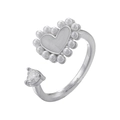 Detailed shot of silver heart ring featuring white pearls and a clear zircon stone - Platinum Heart Pearl