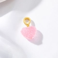 Close-up of a pink heart pendant with glitter texture and gold zircon ring - Light Pink