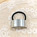 Minimalist elastic ponytail hair tie with a textured silver metal cuff on lace background - Silver Long Rectangular Brushed