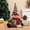 Christmas snowman doll in red and green burlap plaid with a festive carrot nose - Snowman