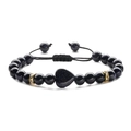 Close-up of heart-shaped blue sandstone bead on an adjustable braided macrame bracelet - Blue Sandstone (Woven)
